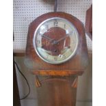 A 1940's oak cased grandmother clock