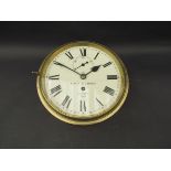 A brass cased bulkhead clock, Roman 8" dial with subsidiary seconds, signed HMS Europa,