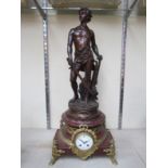 A 19th Century French rouge marble and gilt brass table clock,