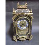 A 19th Century Continental boulle work mantel clock with ornate gilt metal mounts,