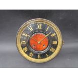 A brass cased bulkhead/drum form clock, 8 day striking movement,