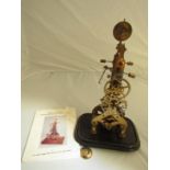 A brass skeleton clock with single fusee movement and grasshopper escapement, with manual,