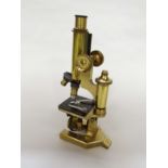 An R & J Beck, London No 26648 monocular microscope with x5, x6.