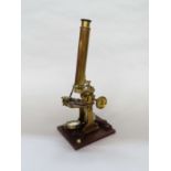 A Victorian Rowley & Sons of Brighton brass monocular microscope with removable body tube,