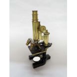 A late 19th/early 20th Century Bausch and Lomb No 54823 monocular microscope with No.