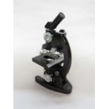 A Cooke, Troughton & Simms Ltd of York, England monocular microscope with x9,