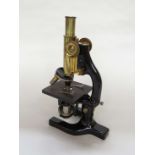 A mid 20th Century Reichert of Austria monocular microscope No.