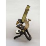 A Henry Crouch, London No 2728 brass monocular microscope with single eye piece,