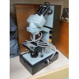 A Vicker/Watson Microsystem 70 binocular microscope,