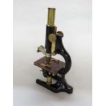 An early 20th Century Winkel-Zeiss Göttingen No 29799 monocular microscope, twin objective lenses,