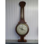 A Victorian mahogany wheel barometer with moulded case and long thermometer box