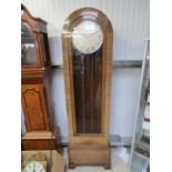 An early 20th Century Deco longcase clock, with chromed Arabic dial signed Gomersall's, Blackpool,