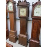 A Georgian oak longcase clock, 12" square dial with silvered Roman chapter ring and brass spandrels,