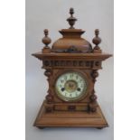 An early 20th Century mahogany cased American mantel clock of architectural form,