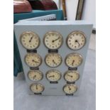 A Gent's of Leicester multi dial and circuit electric slave clock with eleven dials (one missing