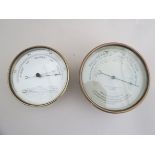 Two brass cased aneroid barometers