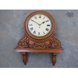 An oak cased dial/bracket clock with carved decoration, Roman 12" dial with 8-day fusee movement,