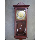 A Metamec 7-day wall clock, silvered Roman chapter ring, Westminster chime, with key,