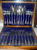 A canteen of cutlery in an inalid box