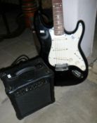Encore electric guitar and a Burswood G10 practice amplifier