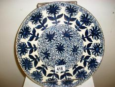An Aesthetic movement Doulton stoneware charger in Japanesque design (approx. diameter 12 1/2" /