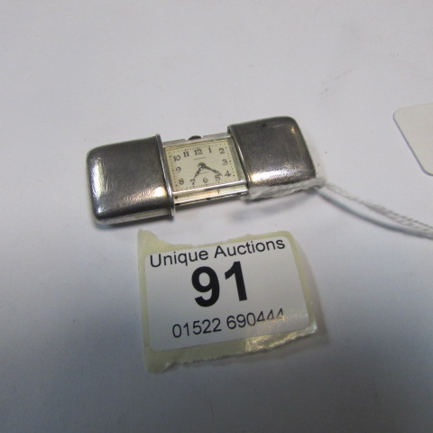 A silver 'fob case' watch marked Movado