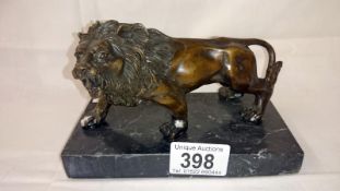 A Bronze of roaring lion on marble base