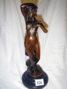 A 20th-century bronze of a semi-nude lady (approx. height 13 1/4" / 33.5cm)