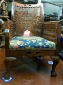 Colonial Rattan chair with ball-and-claw feet