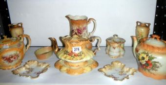 A quantity of Victorian teapots, trays e