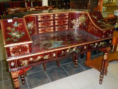 Red lacquered Carlton House desk