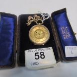 A 14ct gold fob watch with ornate 9ct gold bow in original case
 
Condition
Not currently running