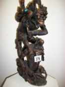 A Burmese wood carving depicting the Monkey Queen (approx. height 16" / 40.5cm)