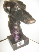 A bronzed-effect cast-iron bust of greyh