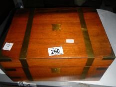 A mahogany brass bound writing box with