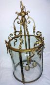 A brass and glass hall lantern
 
Condition
Height 84cm
Diameter 41cm
Glass cylinder height 43cm