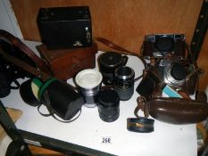 A Brownie boxed camera, lenses etc
