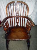 A Windsor carver chair with spindle and splat back (approx. height 34" / 86.5cm)