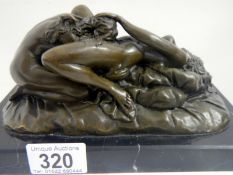 An erotic bronze of two ladies