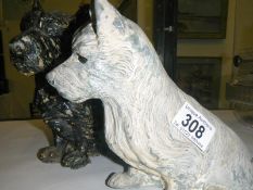 2 large spelter White and Mackays advert