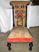 A Georgian prayer chair with old tapestry on upholstery barley twist back, ebonised