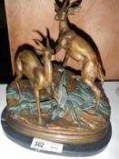 A 20th Century bronze of deer on base