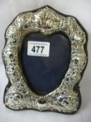 A Silver photograph frame, H.M. London (approx. height 7 3/4" / 19.75cm)
 
Condition
Cardboard