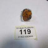 An unusual amber and silver large ring
