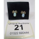 A pair of 9ct gold and opal earrings