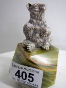 A H.M. silver bear sitting on onyx base (approx. height 4" / 10.25cm)
 
Condition
Good