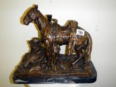 A bronze of a Cowboy on Horse