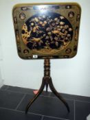 A black laquered tip-top tripod table
 
Condition
Fair to good condition with some minor wear