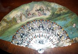 A Mother of pearl fan with Georgian family scene on one side and river scene on the reverse
