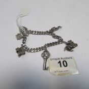 A silver charm bracelet, 44 gms